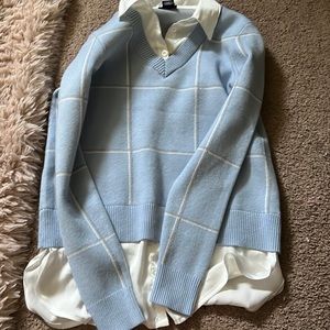 One gray and one blue sweaters